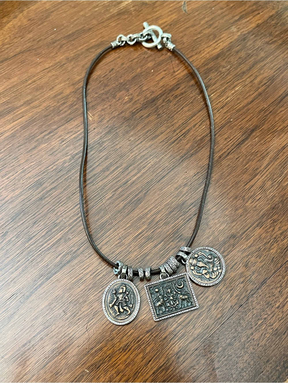 Vintage Silver-Tone Coin Pendant Necklace with Brown Cord